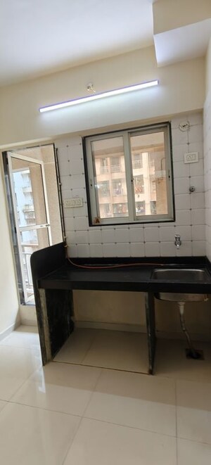 Kitchen in 1 BHK Apartment at Seven Apna Ghar Phase 2 Plot B, Mira Road – for Sale