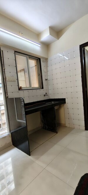 Kitchen in 1 BHK Apartment at Seven Apna Ghar Phase 2 Plot B, Mira Road – for Sale