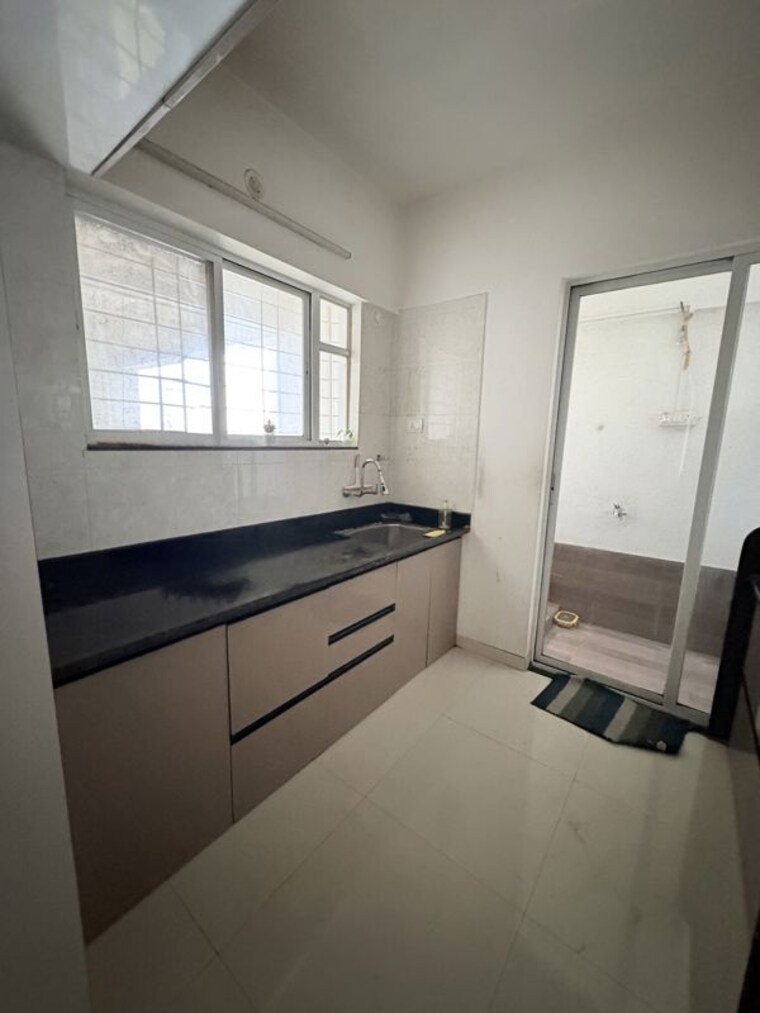 Kitchen, sun-legacy-oasis 3 Bedroom 1050 Sq.Ft. Apartment In Chikhali Pune 10632607