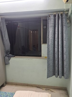 Bedroom in 1 BHK Apartment at Vile Parle East – for Rent