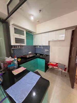 Kitchen in 1 BHK Apartment at Lodha Crown Quality Homes, Majiwada – for Rent