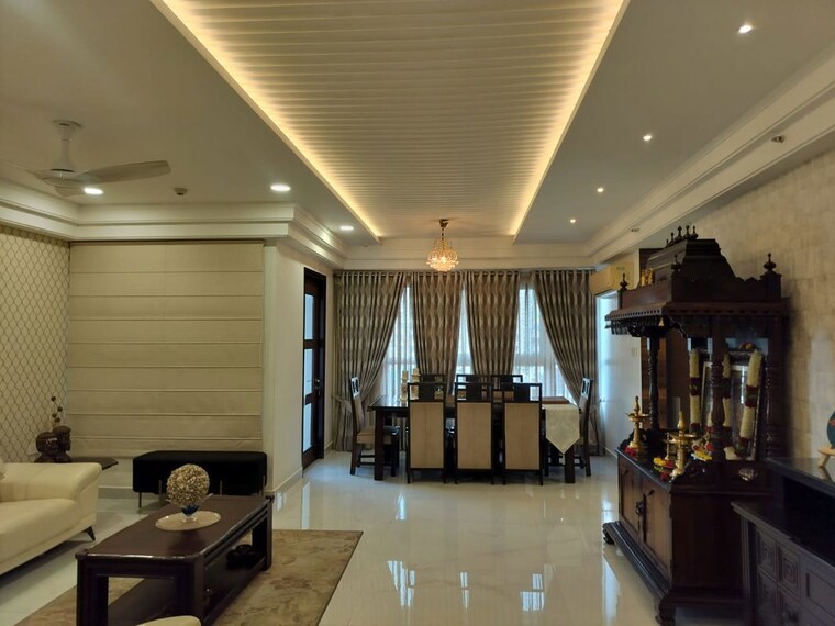 Living Room, universal-botanika-tower-a-and-b 4 Bedroom 4012 Sq.Ft. Apartment In Gachibowli Hyderabad 10620591