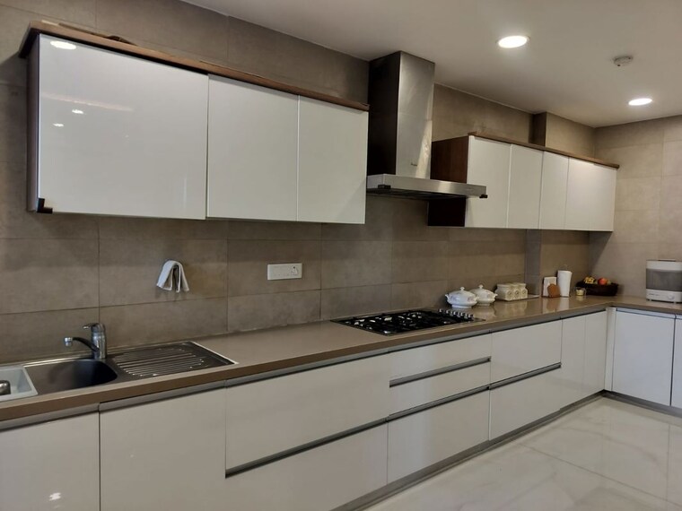 Kitchen, universal-botanika-tower-a-and-b 4 Bedroom 4012 Sq.Ft. Apartment In Gachibowli Hyderabad 10620591