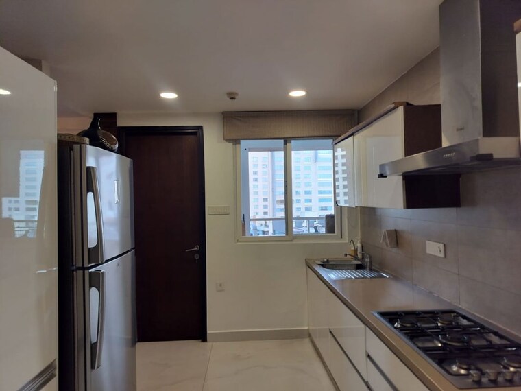 Kitchen, universal-botanika-tower-a-and-b 4 Bedroom 4012 Sq.Ft. Apartment In Gachibowli Hyderabad 10620591