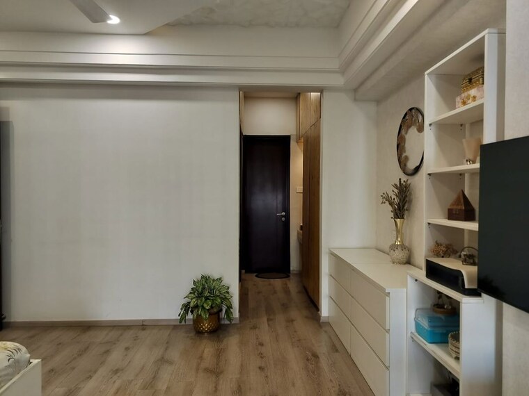 Living Room, universal-botanika-tower-a-and-b 4 Bedroom 4012 Sq.Ft. Apartment In Gachibowli Hyderabad 10620591