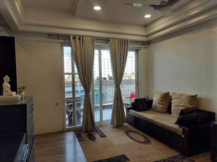Living Room, universal-botanika-tower-a-and-b 4 Bedroom 4012 Sq.Ft. Apartment In Gachibowli Hyderabad 10620591
