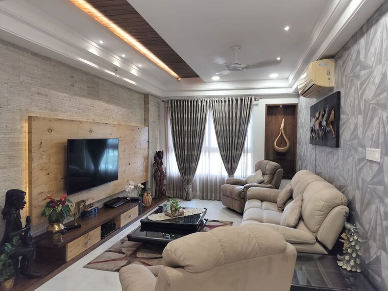 Living Room, universal-botanika-tower-a-and-b 4 Bedroom 4012 Sq.Ft. Apartment In Gachibowli Hyderabad 10620591