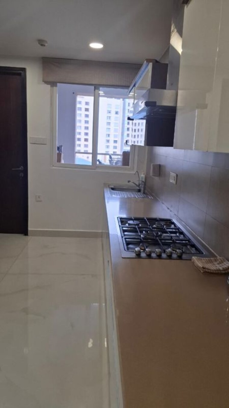 Kitchen, universal-botanika-tower-a-and-b 4 Bedroom 4012 Sq.Ft. Apartment In Gachibowli Hyderabad 10620591