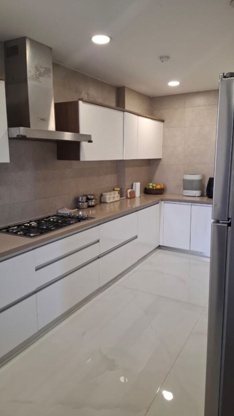 Kitchen, universal-botanika-tower-a-and-b 4 Bedroom 4012 Sq.Ft. Apartment In Gachibowli Hyderabad 10620591