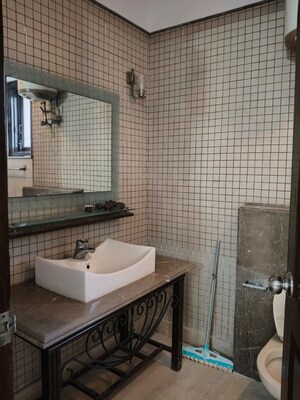 Bathroom in 4 BHK Builder Floor at Vasant Vihar – for Rent