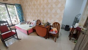 Living Room in 2 BHK Apartment at Man Niketan CHS, Malad West – for Rent