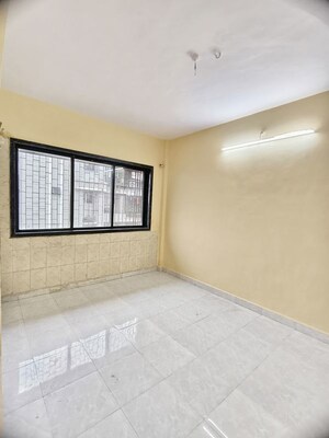 Room in 1 BHK Apartment at Riddhi Garden, Malad East – for Rent