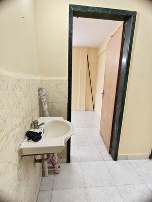 Bathroom in 1 BHK Apartment at Riddhi Garden, Malad East – for Rent