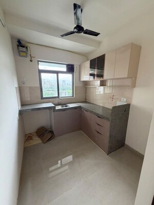 Kitchen in 1.5 BHK Apartment at Piramal Vaikunth, Balkum Pada – for Rent