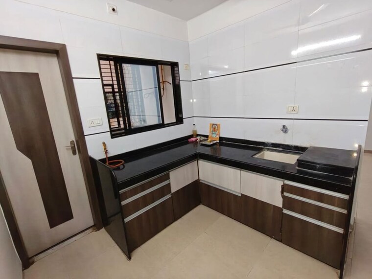 Kitchen, althan 2 Bedroom 1200 Sq.Ft. Apartment In Althan Surat 10632772