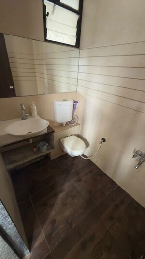 Bathroom in 3 BHK Apartment at Althan – for Rent