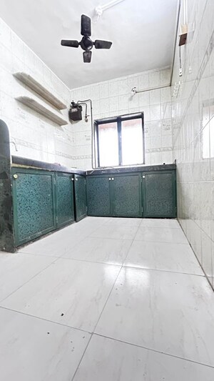 Kitchen in 2 BHK Apartment at Yashodham Complex, Goregaon East – for Rent