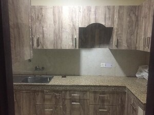 Kitchen in 3 BHK Builder Floor at BPTP District, Sector 81 – for Sale
