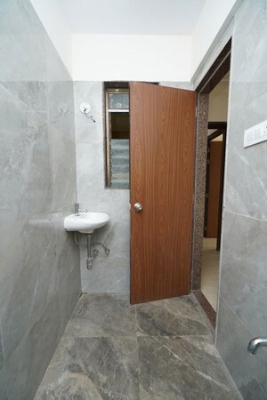Bathroom in 2 BHK Apartment at Abrol Signature, Malad West – for Sale
