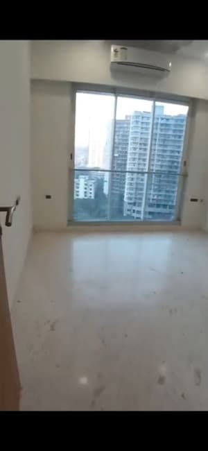 Bedroom in 2.5 BHK Apartment at Ekta Tripolis, Goregaon West – for Rent