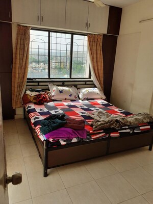 Bedroom in 2 BHK Apartment at Anand Nagar Park CHS, Kothrud – for Rent