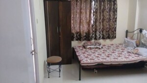 Bedroom in 2 BHK Apartment at Anand Nagar Park CHS, Kothrud – for Rent
