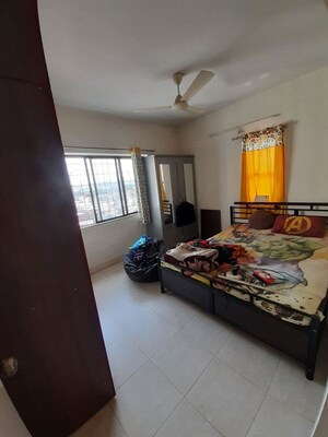 Bedroom in 2 BHK Apartment at Anand Nagar Park CHS, Kothrud – for Rent