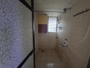 Bathroom in 1 BHK Apartment at Vihang Valley Phase 2, Kasarvadavali – for Rent