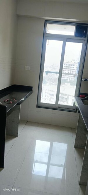 Kitchen in 2 BHK Apartment at Triumph Swastik, Malad West – for Sale