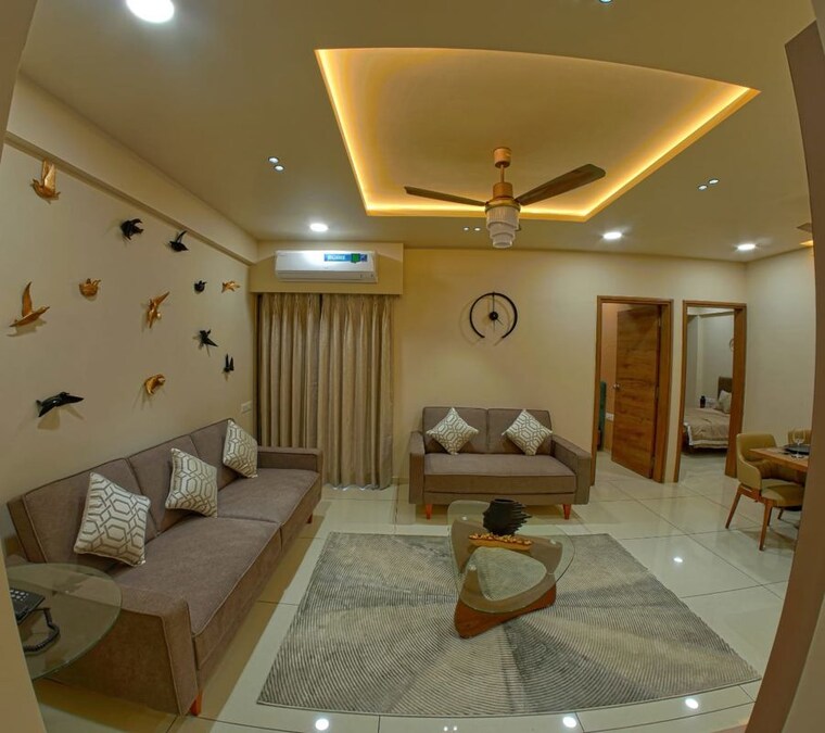 Living Room, everest-trinity 2 Bedroom 753 Sq.Ft. Apartment In Bhayli Vadodara 10632906