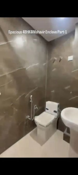Bathroom in 4 BHK Builder Floor at Mahavir Enclave – for Sale
