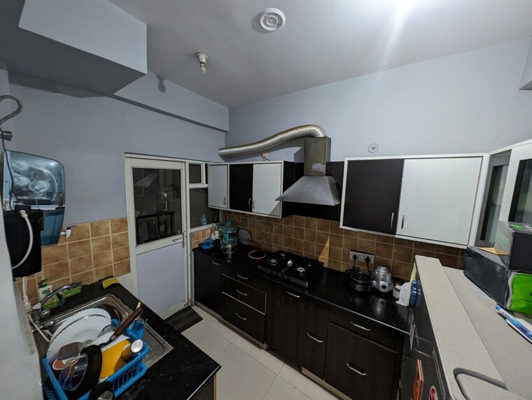 Kitchen, mahagun-moderne 2.5 Bedroom 1290 Sq.Ft. Apartment In Sector 78 Noida 10632987