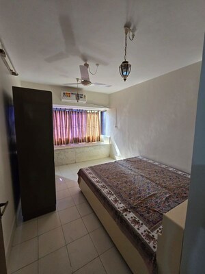 Bedroom in 2 BHK Apartment at Bandra West – for Rent