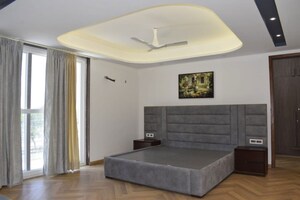 Bedroom in 4 BHK Builder Floor at Sushant Lok ii – for Rent