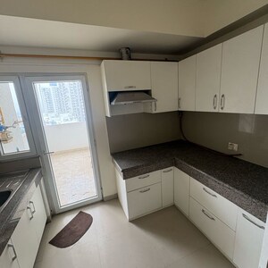 Kitchen in 3.5 BHK Apartment at Emaar The Enclave, Sector 66 – for Rent