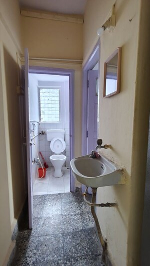 Bathroom in 1 RK Apartment at Vasant Valley Complex, Malad East – for Rent