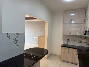 Kitchen in 2 BHK Apartment at Brigade Buena Vista, Budigere – for Rent