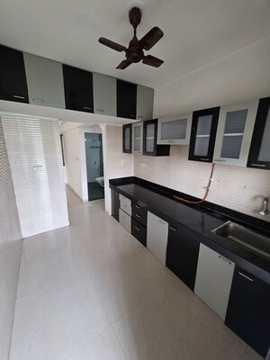 Kitchen in 2 BHK Apartment at Cosmos Jewels, Ghodbunder Road – for Rent