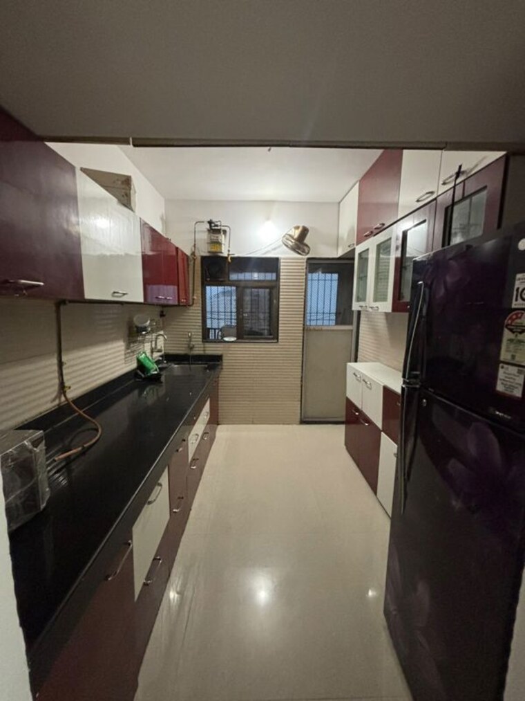 Kitchen, cosmos-jewels 2.5 Bedroom 720 Sq.Ft. Apartment In Ghodbunder Road Thane 10633177