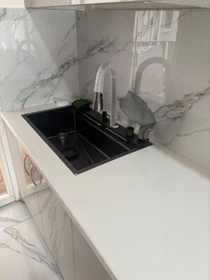 Kitchen in 2 BHK Apartment at Signature Global City, Sector 37d – for Rent
