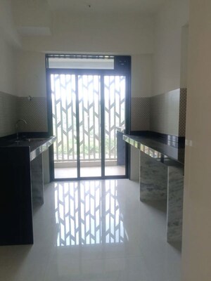 Kitchen in 2 BHK Apartment at Lodha Woods, Kandivali East – for Sale