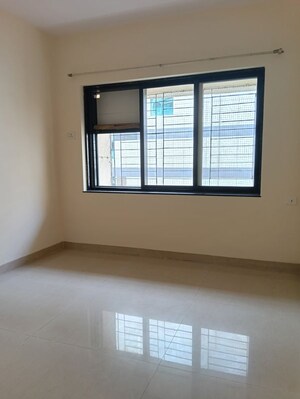 Room in 2 BHK Apartment at K Raheja Palm Court, Malad West – for Rent