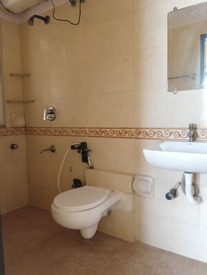 Bathroom in 2 BHK Apartment at K Raheja Palm Court, Malad West – for Rent