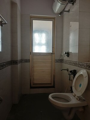 Bathroom in 2 BHK Apartment at K Raheja Palm Court, Malad West – for Rent