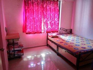 Bedroom in 2 BHK Apartment at RK Lunkad Nisarg Pushp, Pimple Nilakh – for Rent