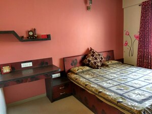Bedroom in 2 BHK Apartment at RK Lunkad Nisarg Pushp, Pimple Nilakh – for Rent