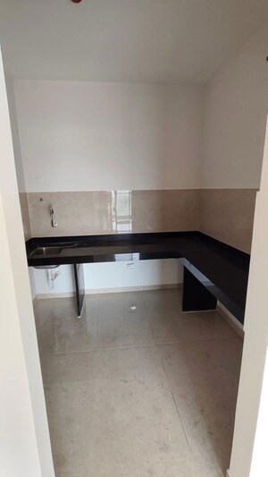 Kitchen in 2 BHK Apartment at Unique Youtopia, Kharadi – for Rent