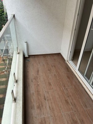 Balcony in 2.5 BHK Apartment at Da Costa Square, Cooke Town – for Rent