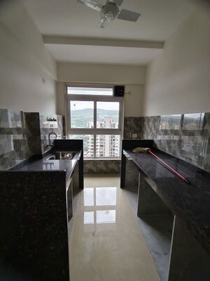 Kitchen in 2 BHK Apartment at Group Satellite Elegance, Goregaon East – for Rent