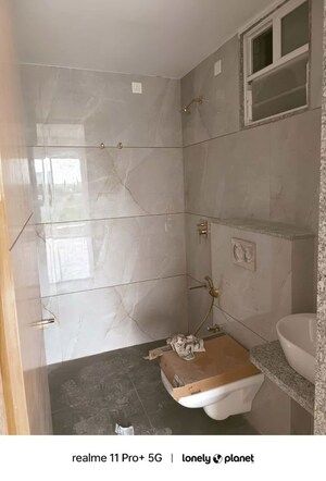 Bathroom in 3 BHK Apartment at Courtyard Regalia, Bhayli – for Sale